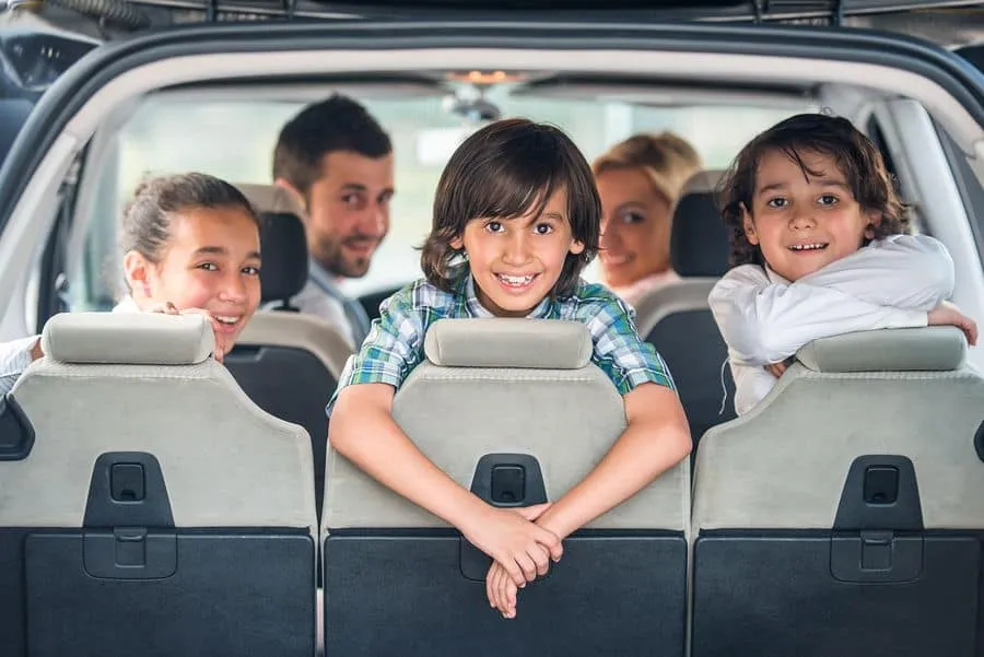 Family in car on the way to Thanksgiving